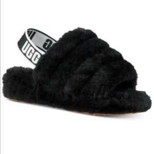Fluffy black Ugg slides